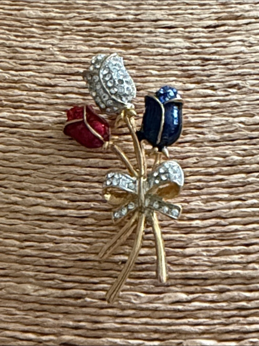 Red white and blue crystal roses bouquet with a pave crystal bow brooch